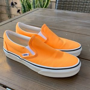 Vans neon orange slip on